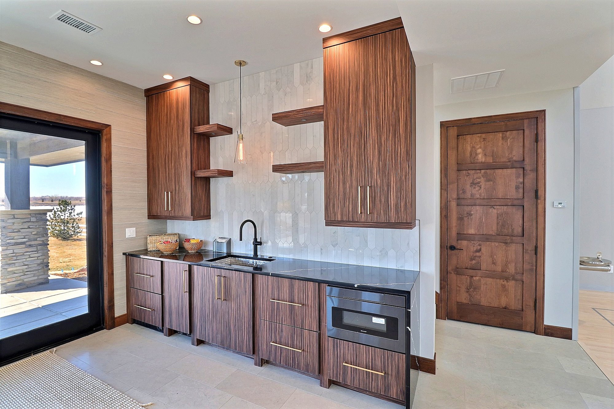 Custom wet bar with cabinetry